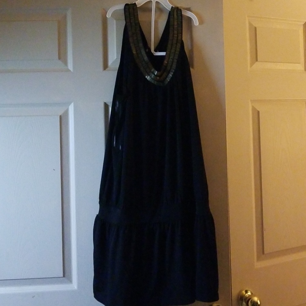 Shirt or can be worn as a dress